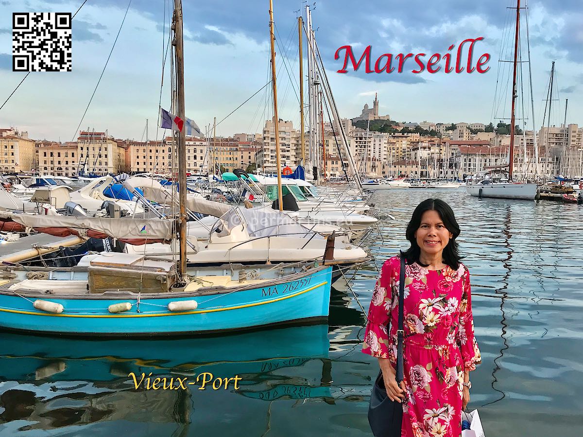 France Marseille woman standing in front of boats at the Vieux-Port