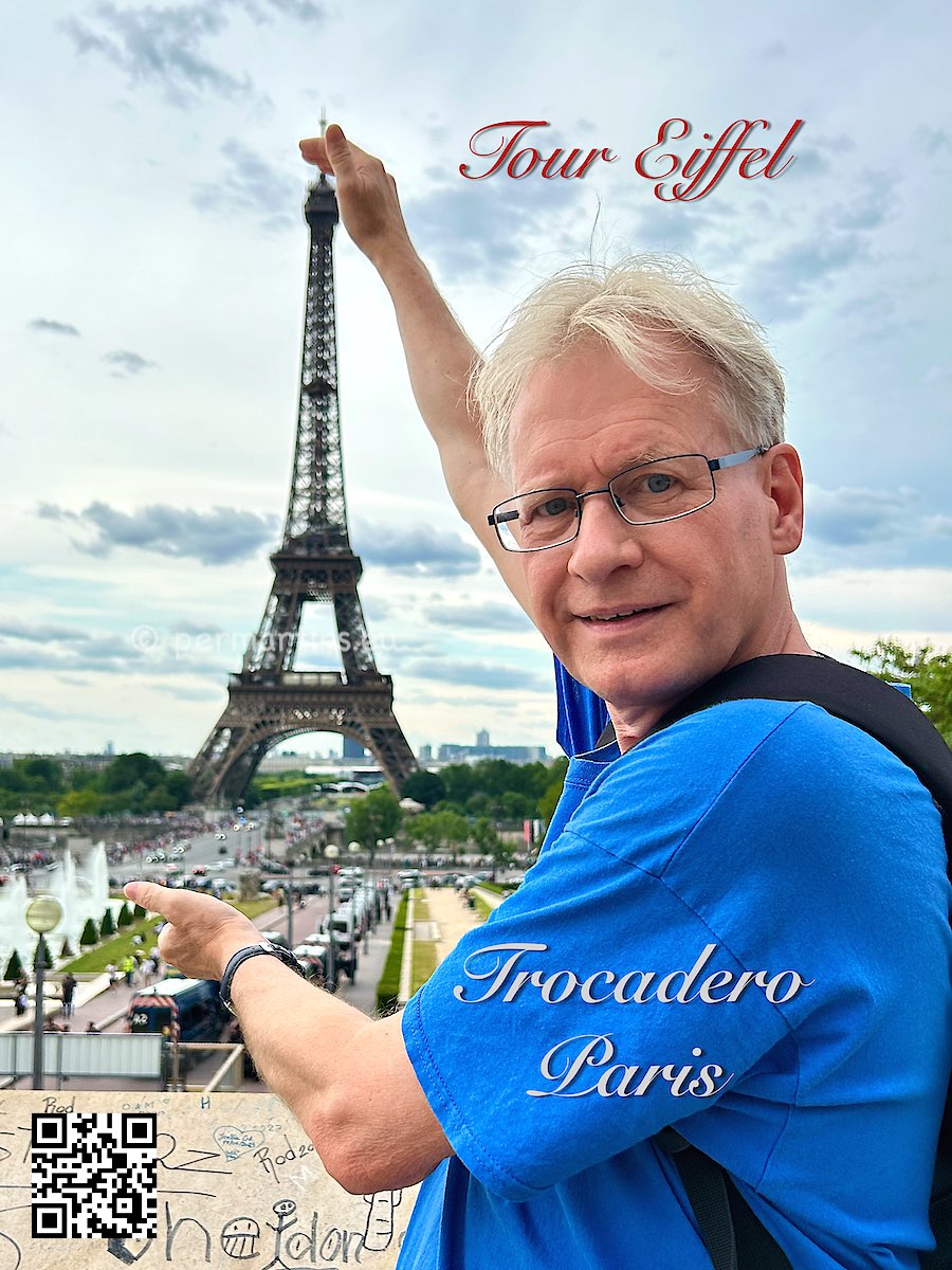 France Paris Tour Eiffel man holding the Eiffel Tower 