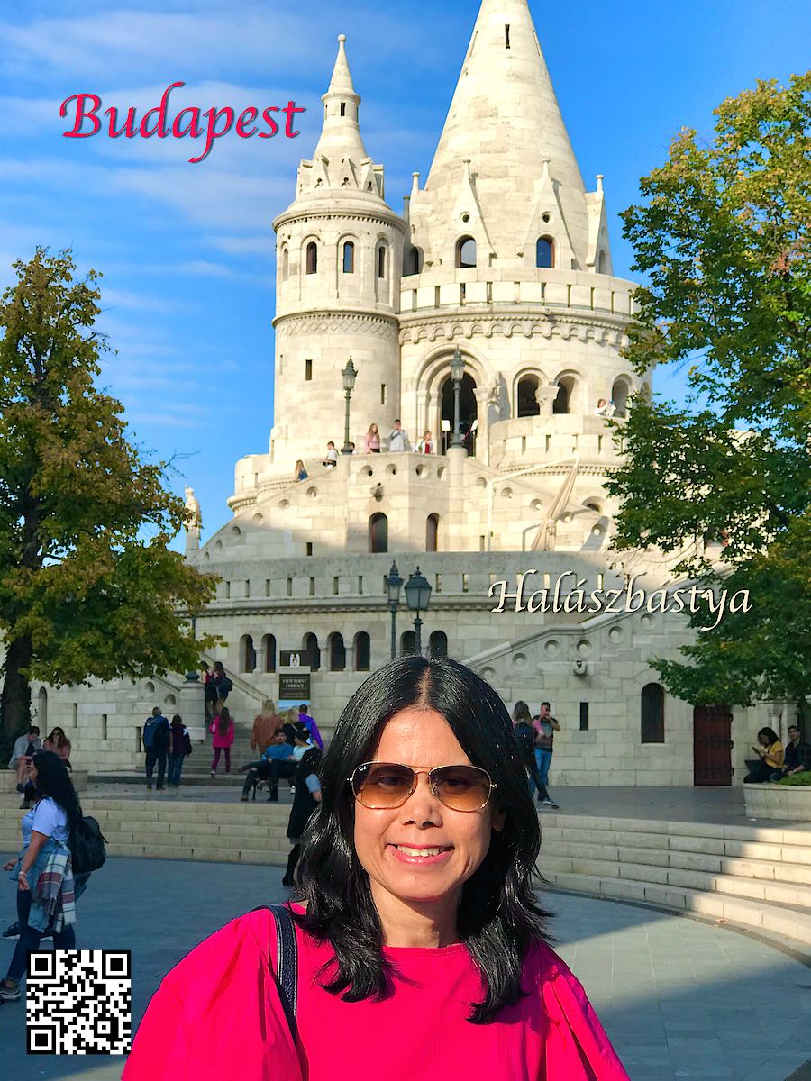 Hungary Budapest woman wearing sunglasses in front of Fisherman