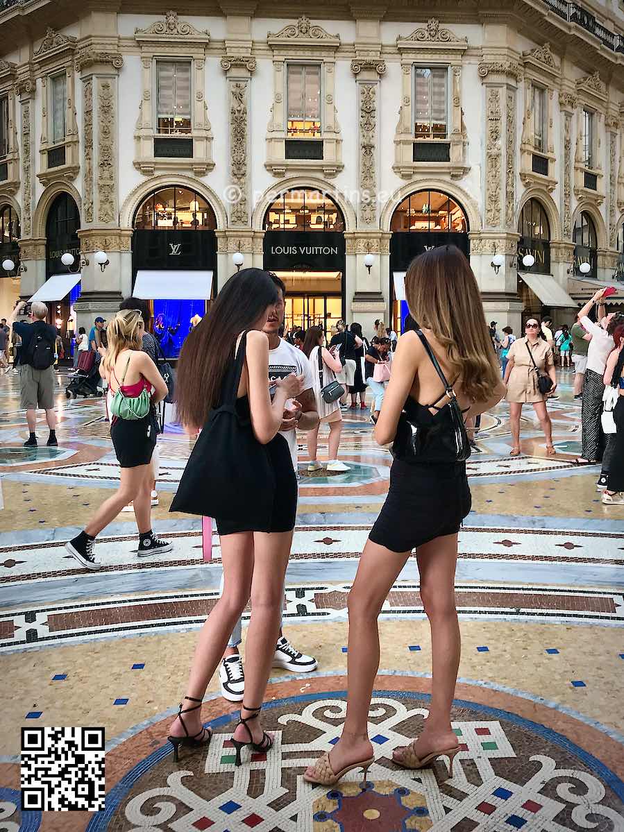 Italy Milano in Galleria Vittorio Emanuele II with two models