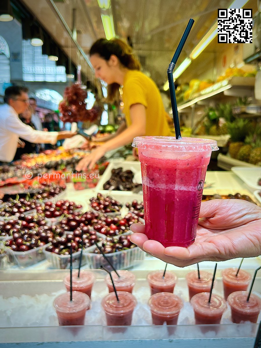Spain Valencia Mercado Central fruit juice in a plastic cup.